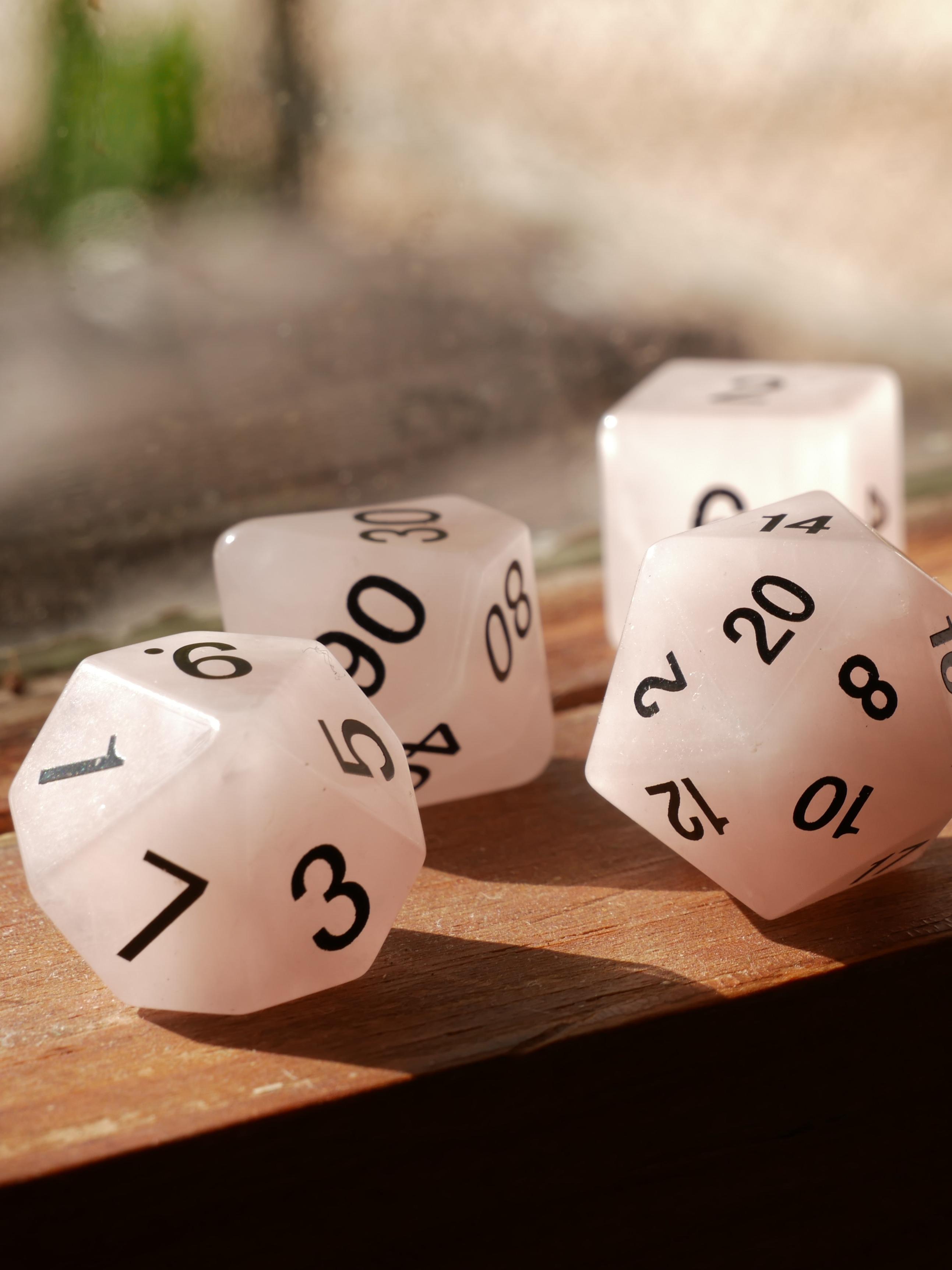 Rose colored acrylic dungeons and dragons dice