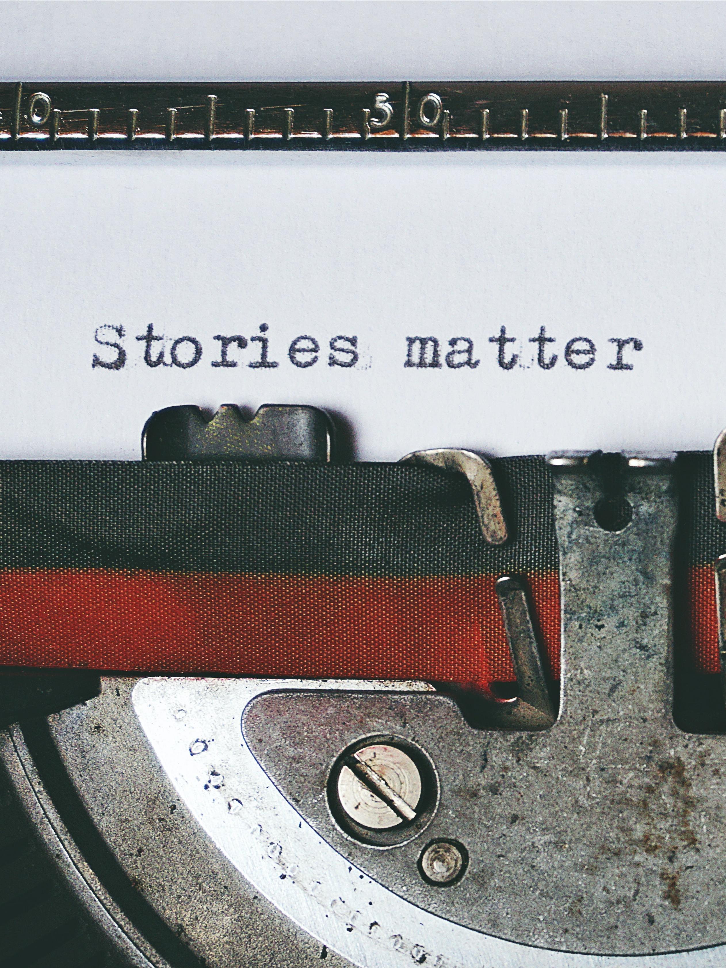 type writing, typing the words, stories matter